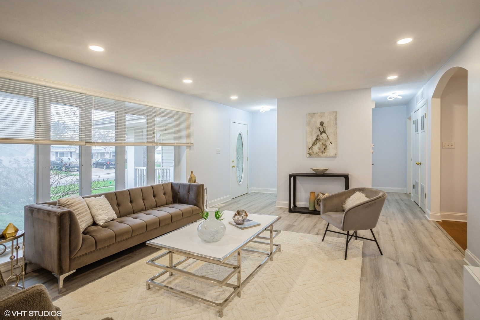 943 Maple Lane Elk Grove Village, IL 60007 - Photo 3 of 17 a living room with furniture and a floor to ceiling window