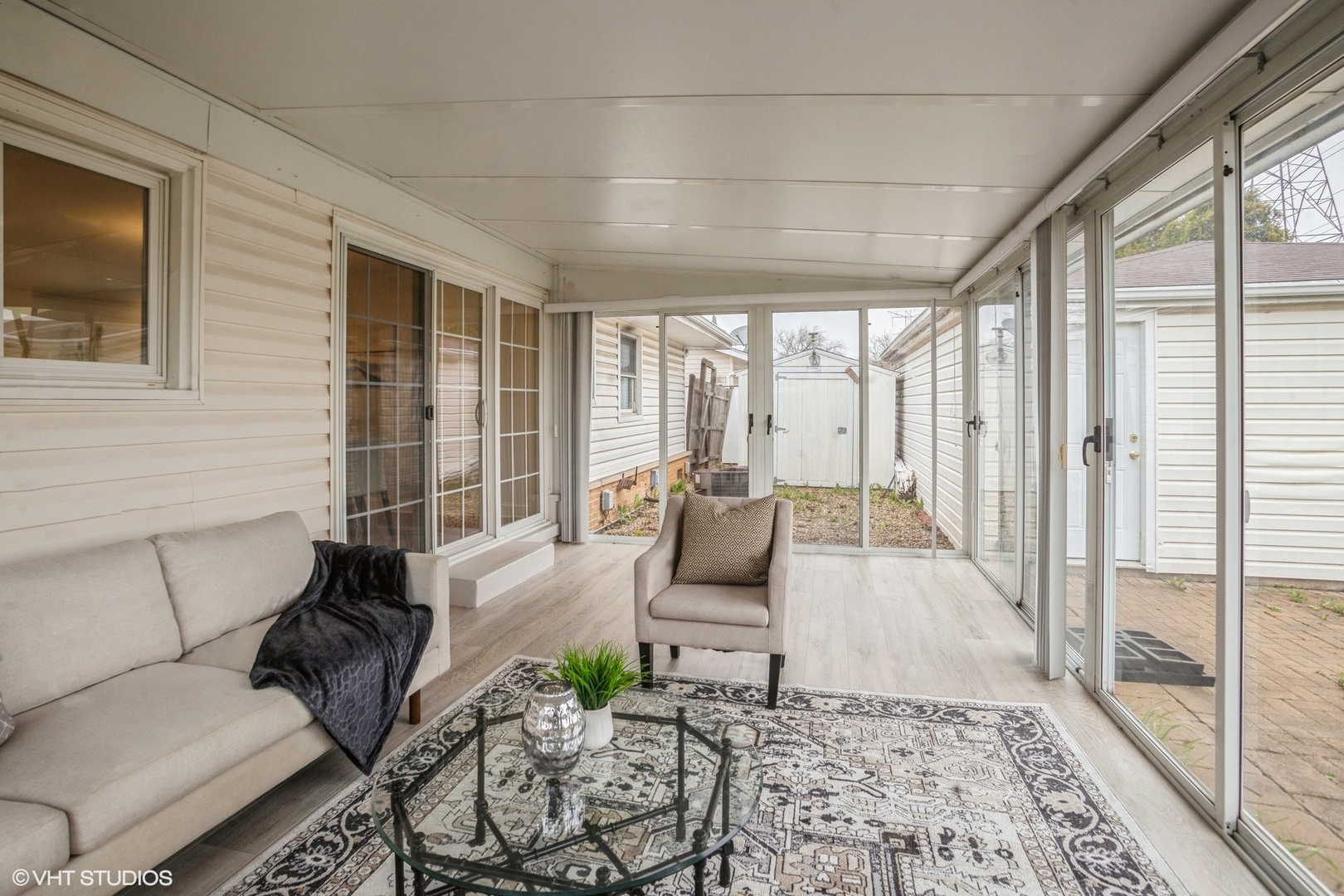 943 Maple Lane Elk Grove Village, IL 60007 - Photo 10 of 17 a living room with furniture and a flat screen tv