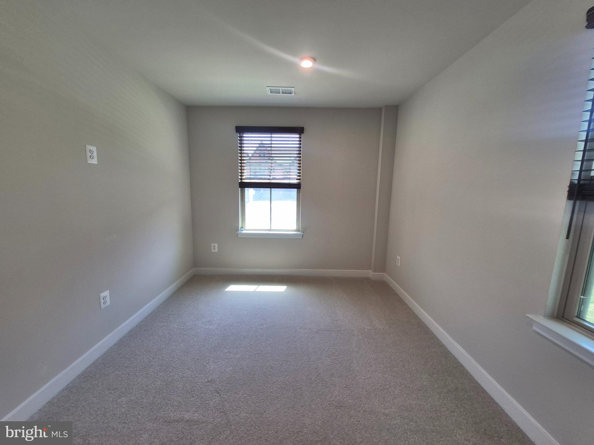 6054 Fallfish Court New Market, MD 21774 - Photo 21 of 28 an empty room with windows
