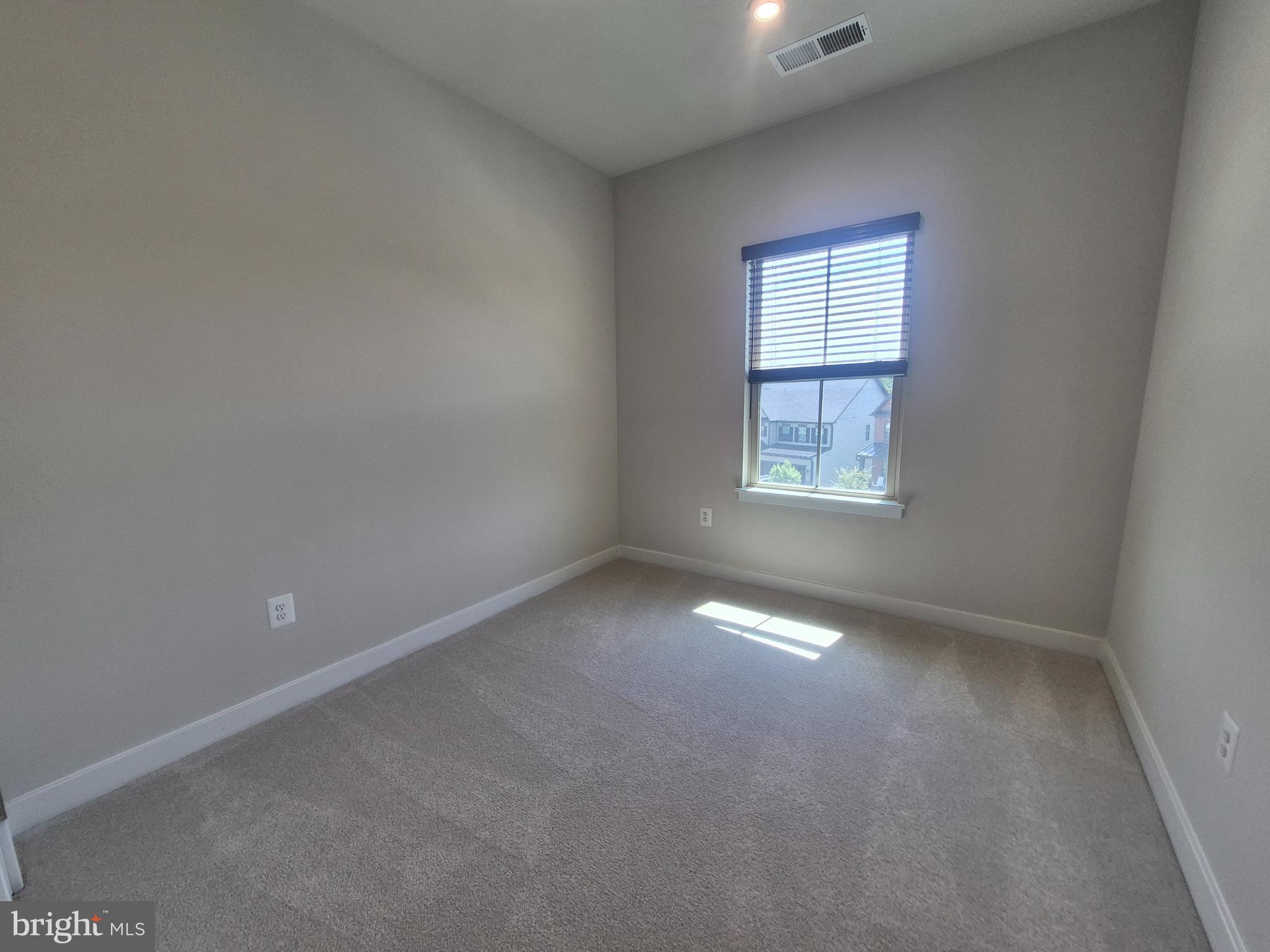 6054 Fallfish Court New Market, MD 21774 - Photo 24 of 28 an empty room that has a window