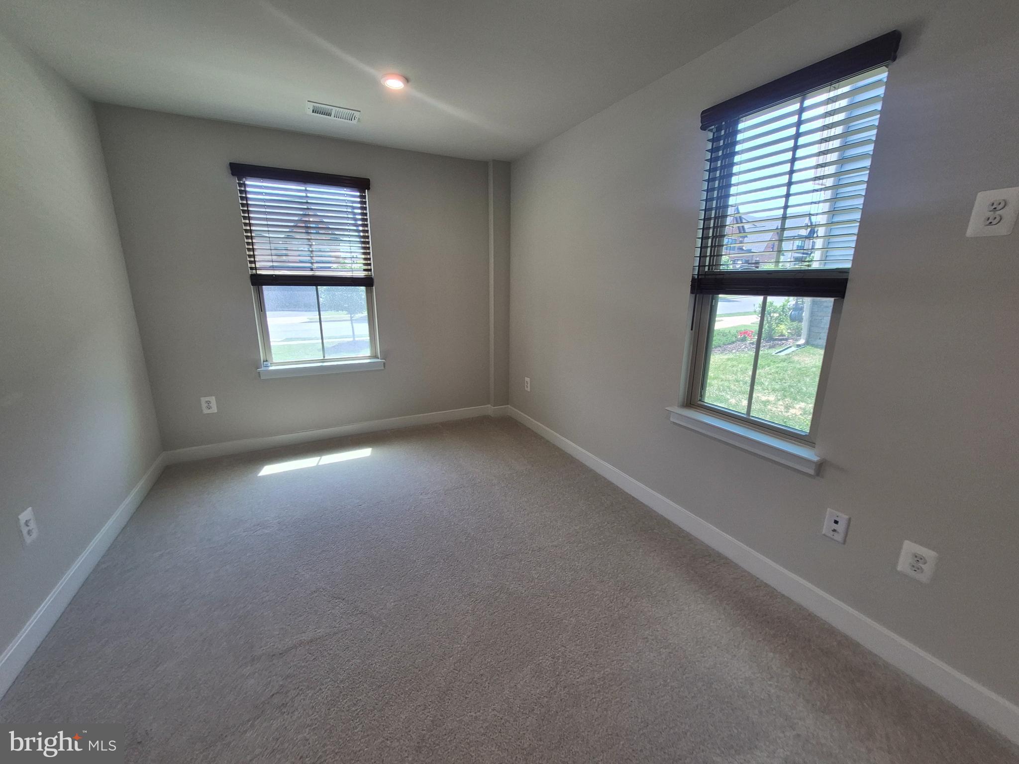 6054 Fallfish Court New Market, MD 21774 - Photo 25 of 28 an empty room with windows