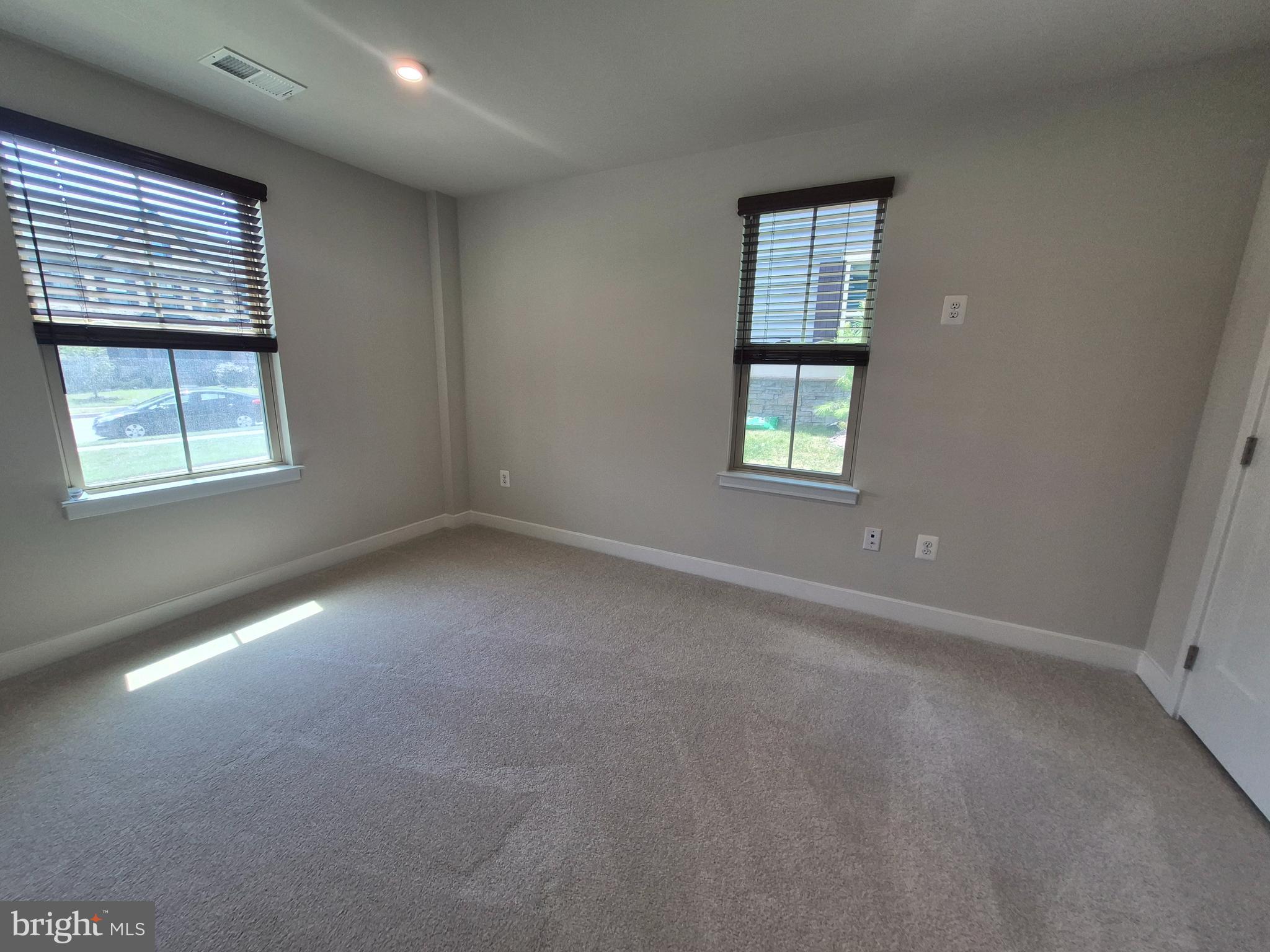 6054 Fallfish Court New Market, MD 21774 - Photo 26 of 28 an empty room with windows