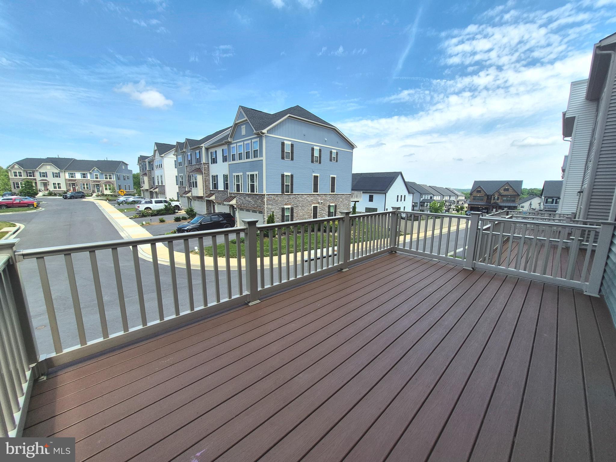 6054 Fallfish Court New Market, MD 21774 - Photo 27 of 28 a view of a balcony with wooden floor