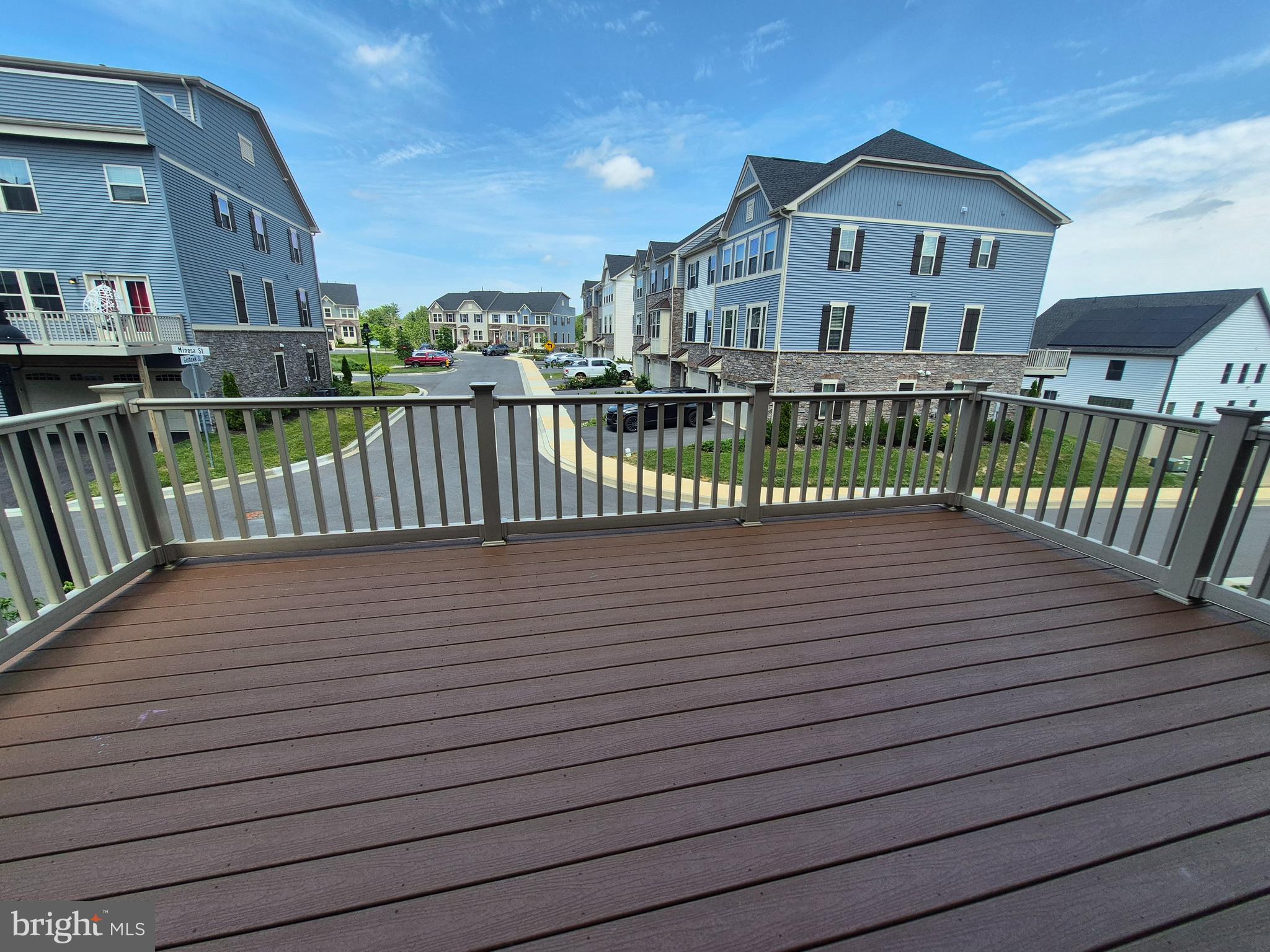 6054 Fallfish Court New Market, MD 21774 - Photo 28 of 28 a view of a house with a wooden deck