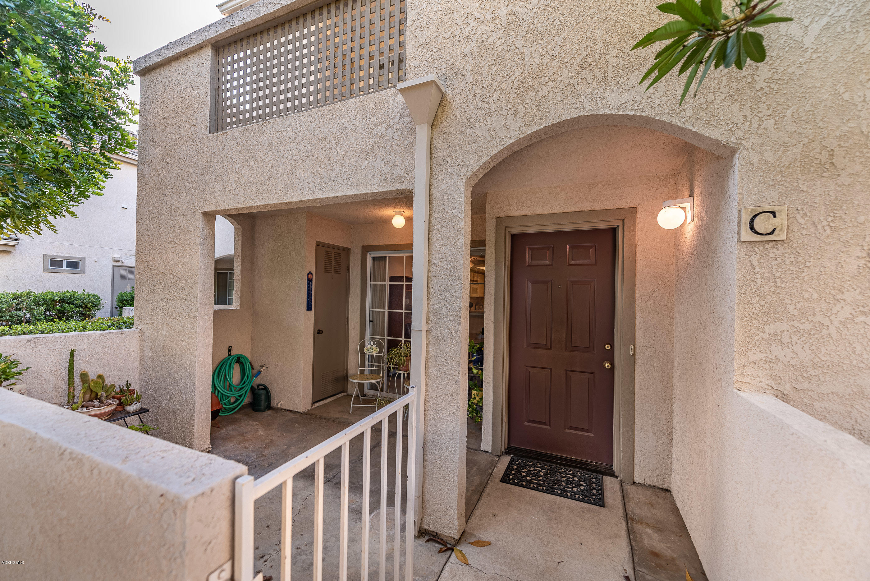 1007 Waltham Road, Unit C Simi Valley, CA 93065 - Photo 2 of 25 a view of a house with a potted plant