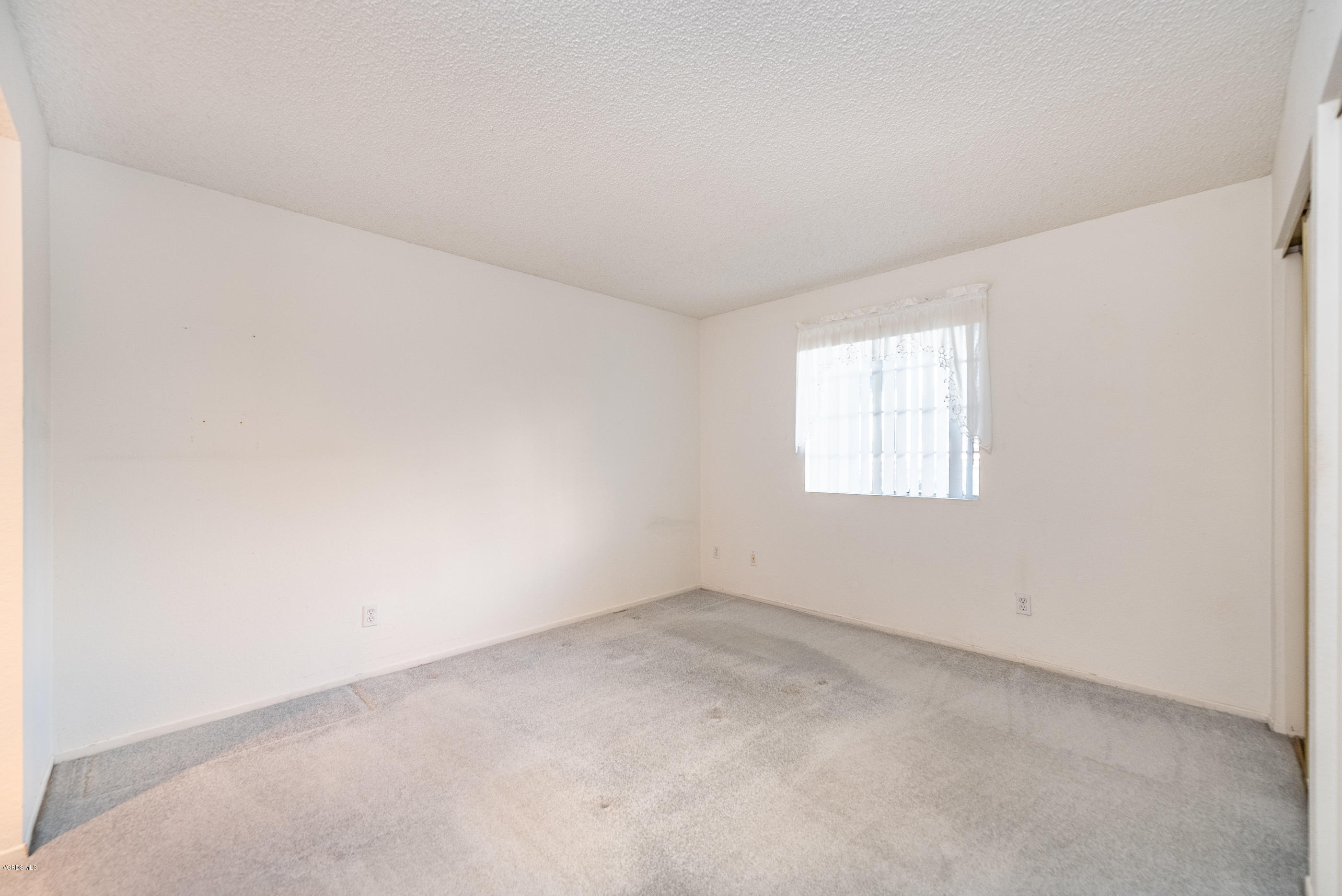 1007 Waltham Road, Unit C Simi Valley, CA 93065 - Photo 13 of 25 an empty room with a window