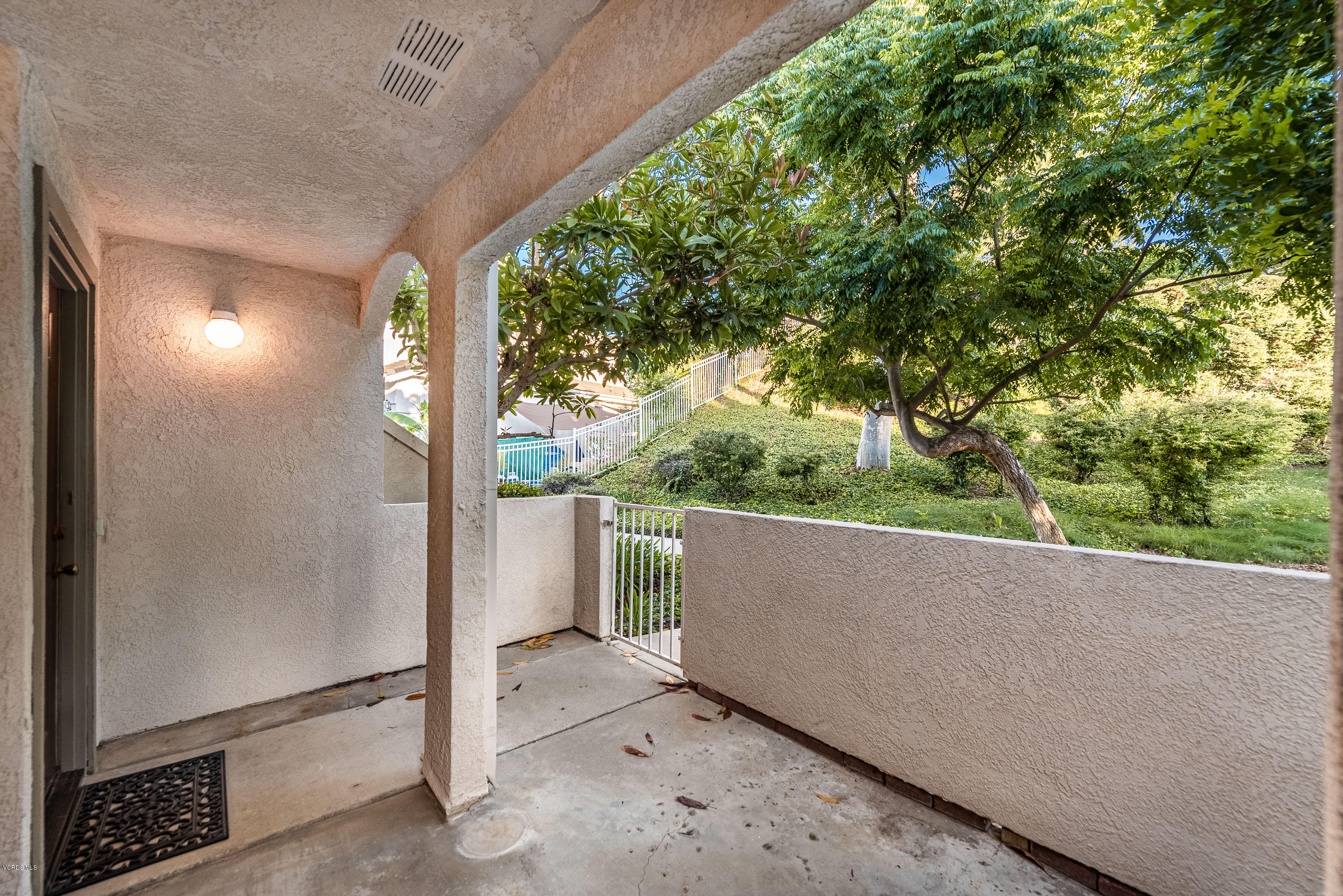 1007 Waltham Road, Unit C Simi Valley, CA 93065 - Photo 19 of 25 a view of a floor to ceiling window and tree