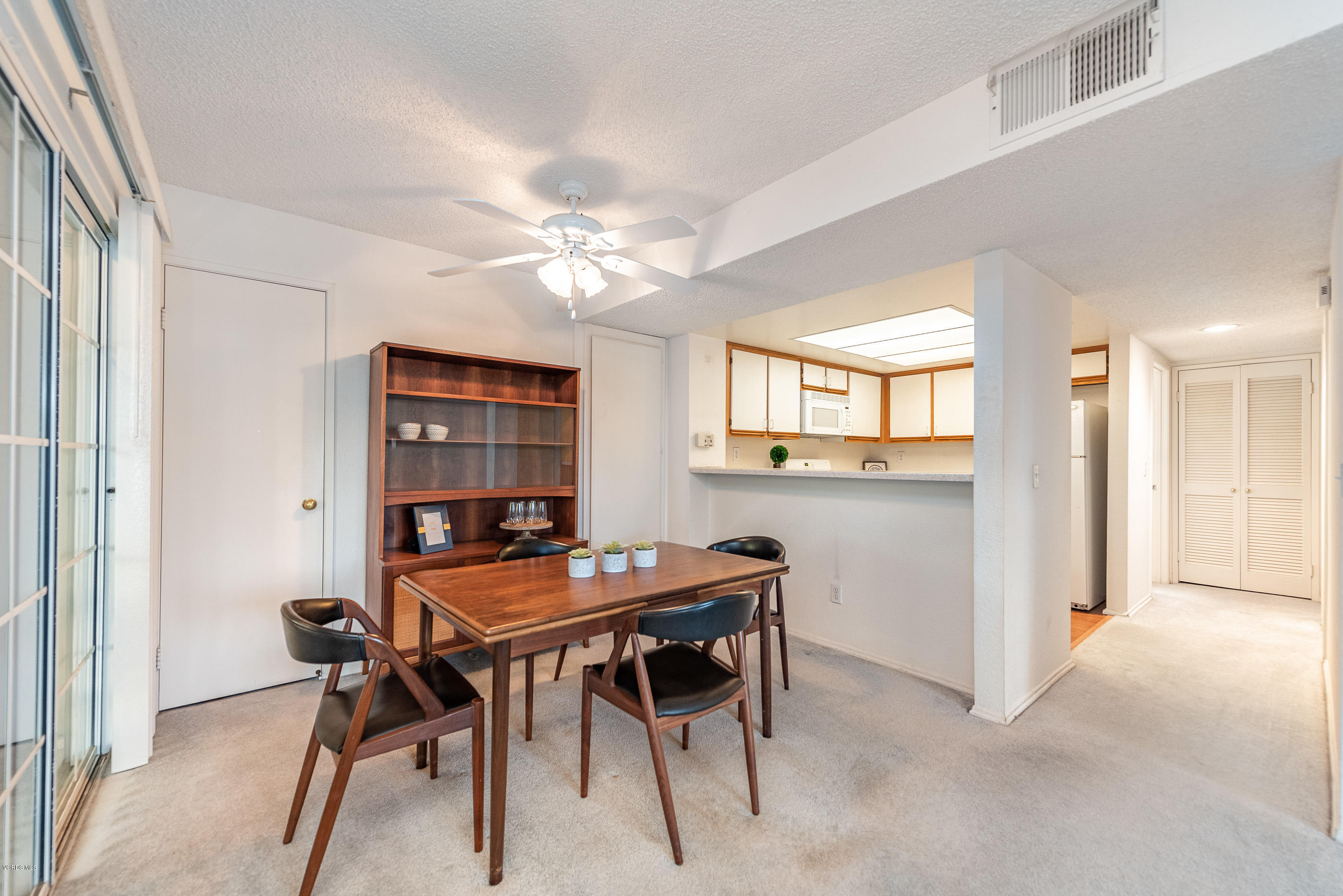 1007 Waltham Road, Unit C Simi Valley, CA 93065 - Photo 3 of 25 a dining room with furniture and window