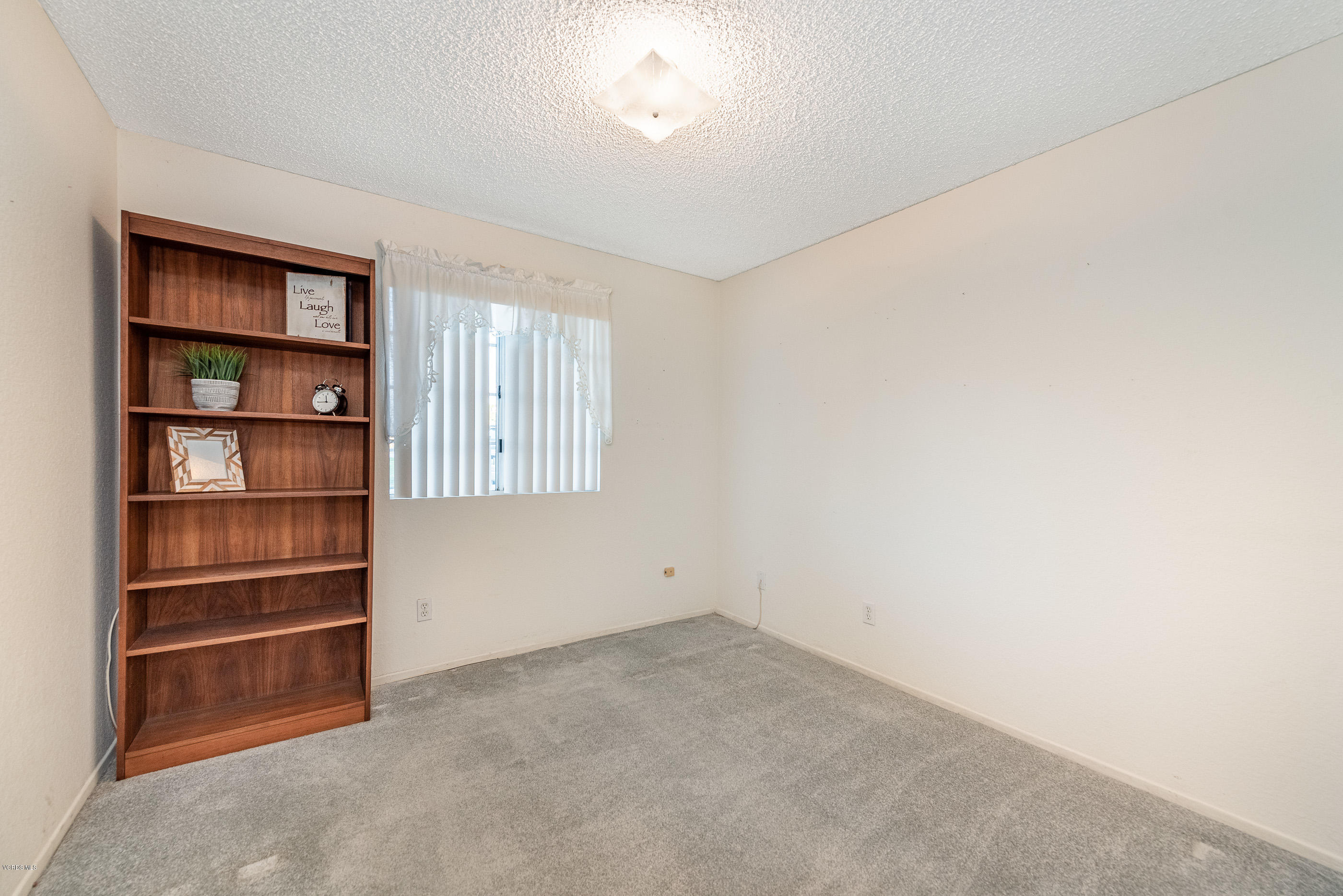 1007 Waltham Road, Unit C Simi Valley, CA 93065 - Photo 10 of 25 a view of an empty room with a closet