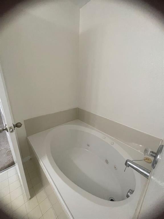 12645 Pricklybranch Drive Fort Worth, TX 76244 - Photo 12 of 21 a bath tub sitting in a bathroom