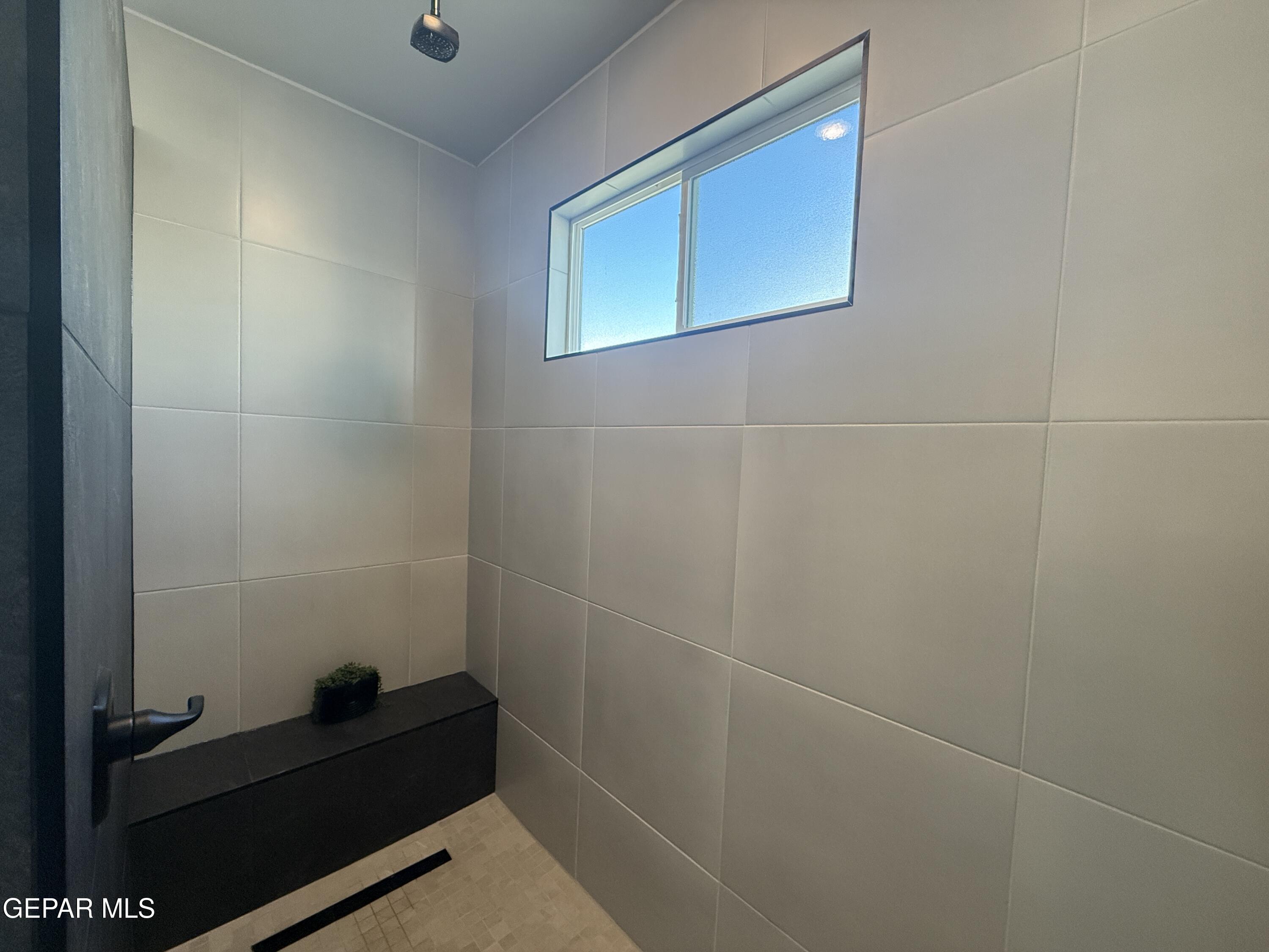 12505 Exton Court El Paso, TX 79928 - Photo 14 of 28 a bathroom with a bathtub