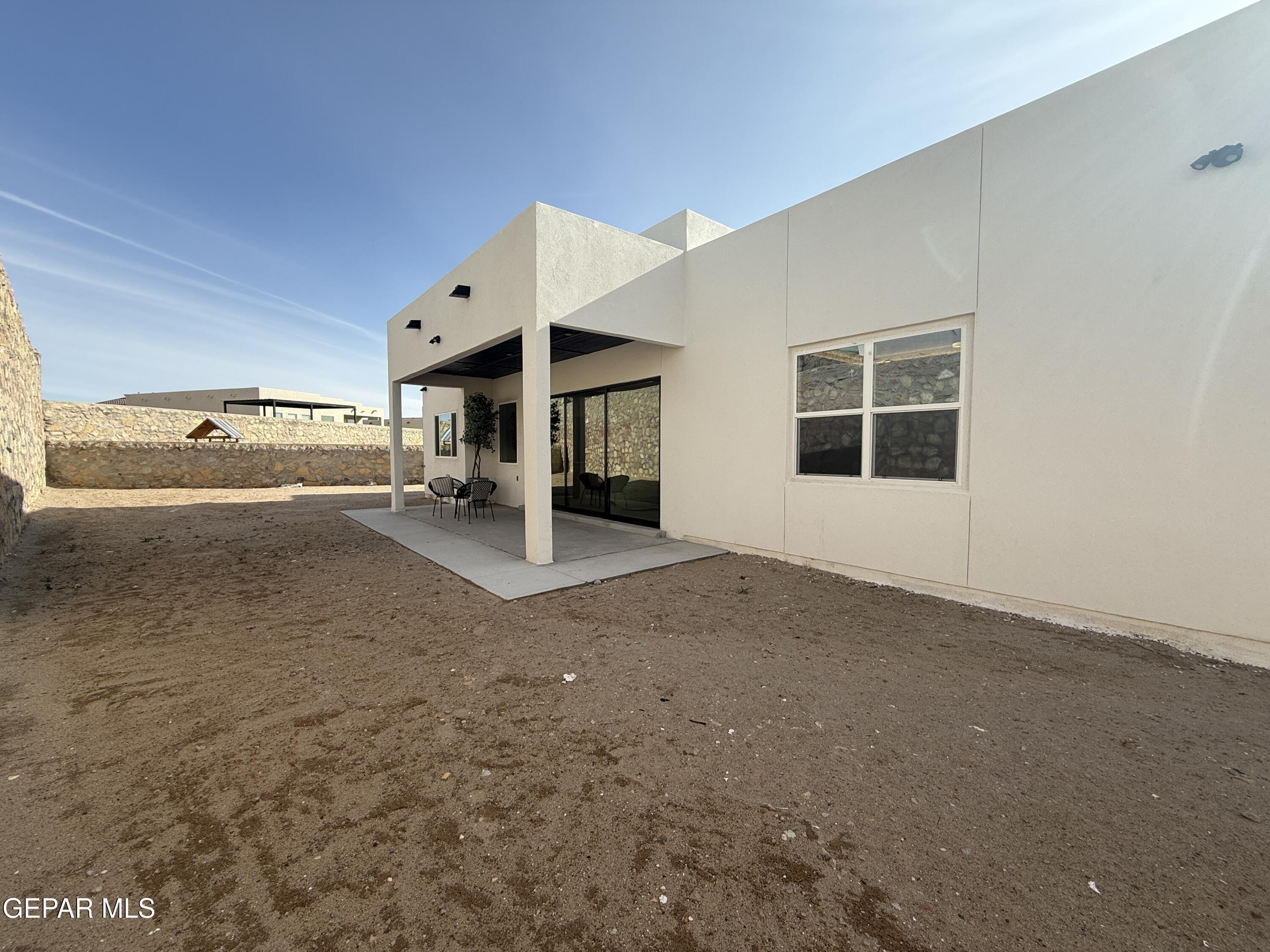 12505 Exton Court El Paso, TX 79928 - Photo 25 of 28 an empty room with windows