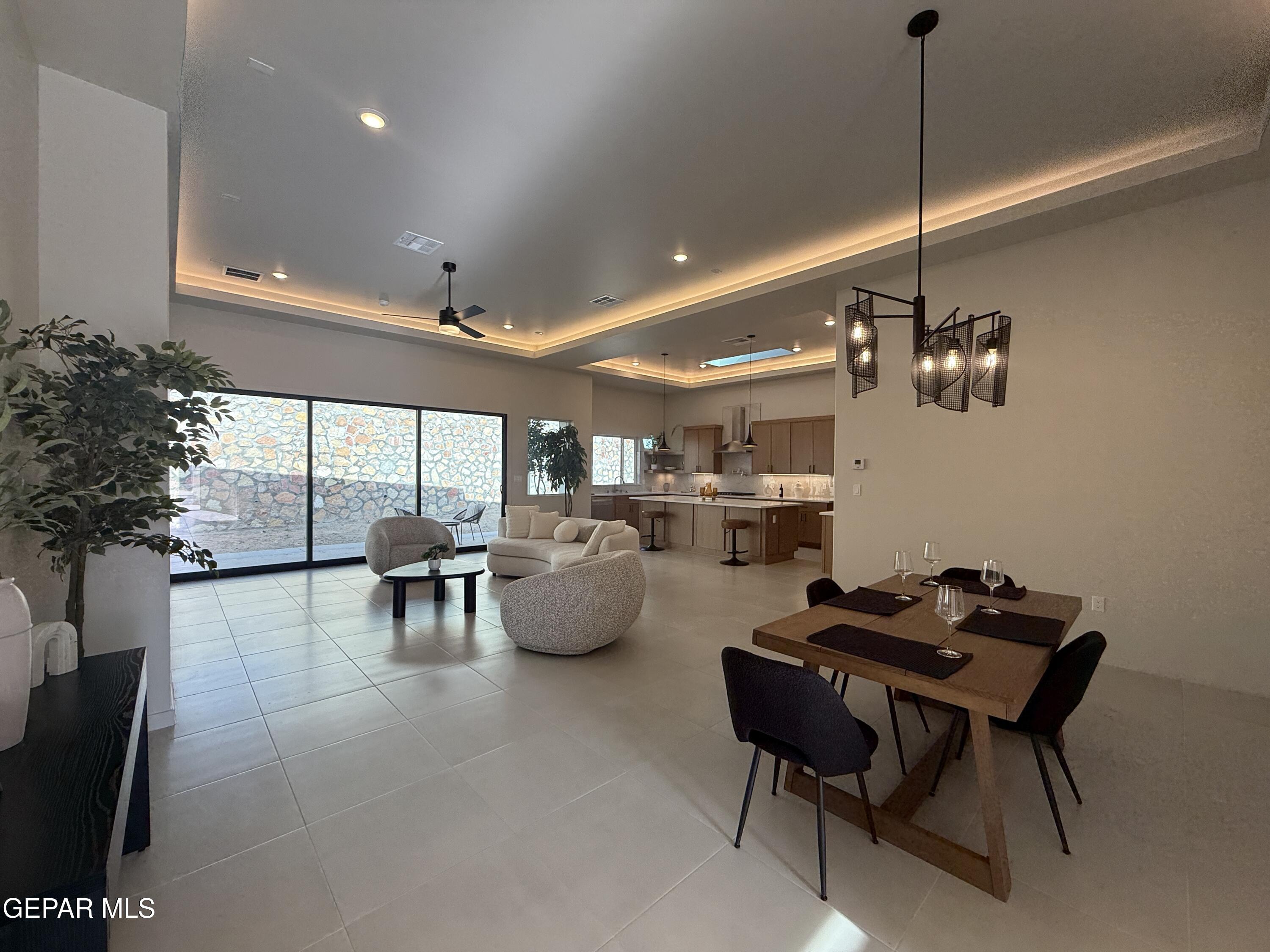 12505 Exton Court El Paso, TX 79928 - Photo 5 of 28 a view of a dining room with furniture and chandelier