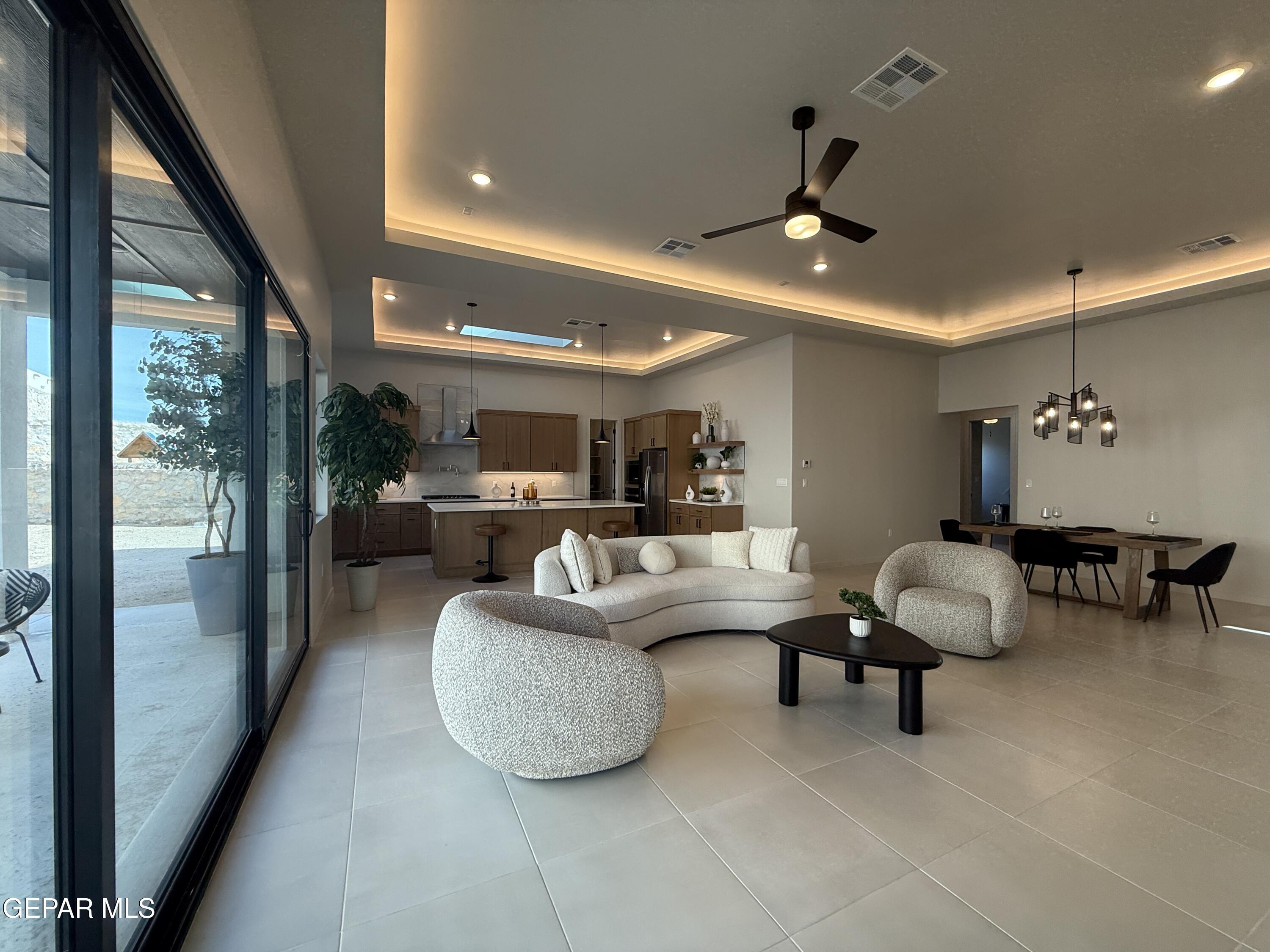 12505 Exton Court El Paso, TX 79928 - Photo 6 of 28 a living room with furniture and a ceiling fan