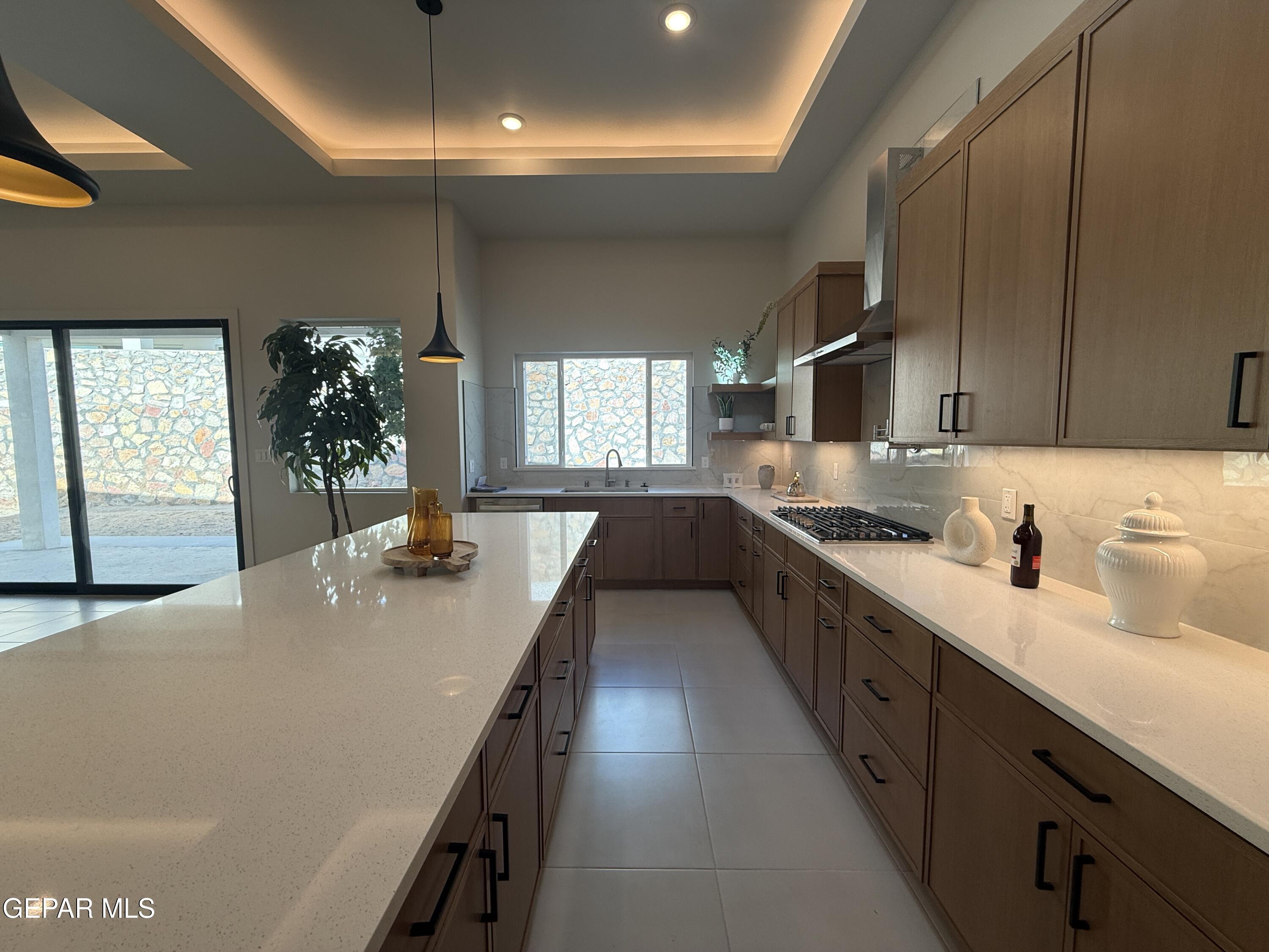 12505 Exton Court El Paso, TX 79928 - Photo 8 of 28 a large kitchen with stainless steel appliances granite countertop a lot of counter space
