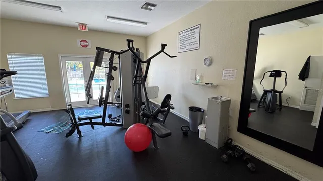 a view of a room with gym equipment