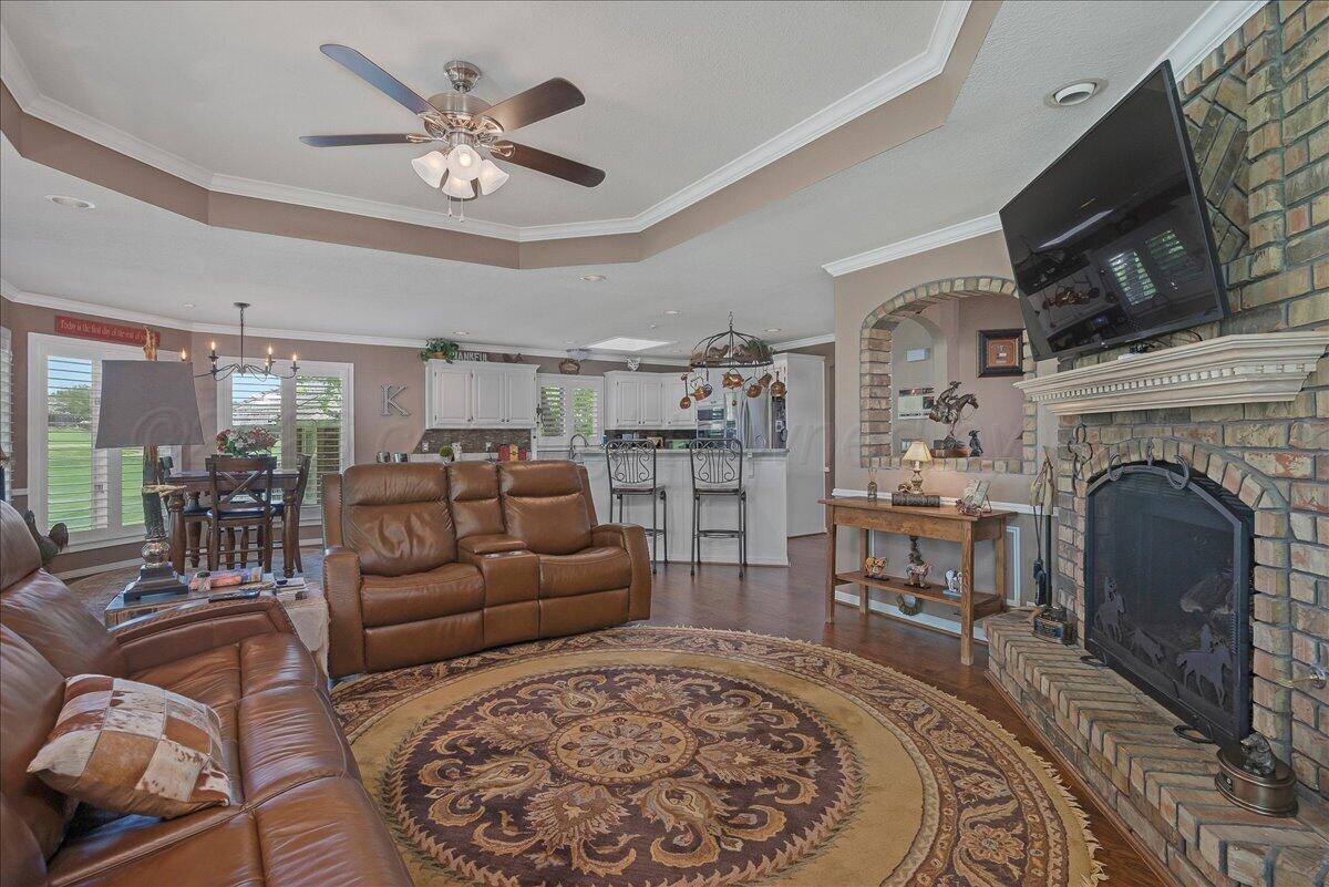 5 Locke Place Amarillo, TX 79124 - Photo 7 of 53 a living room with furniture and a fireplace