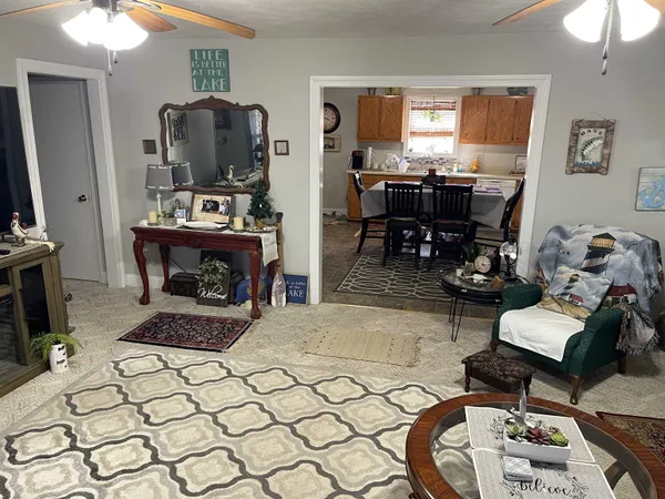 a bedroom with a bed and a dresser in it