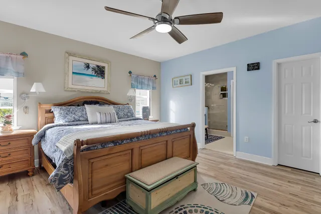 a kitchen with lots of clutter and cabinets