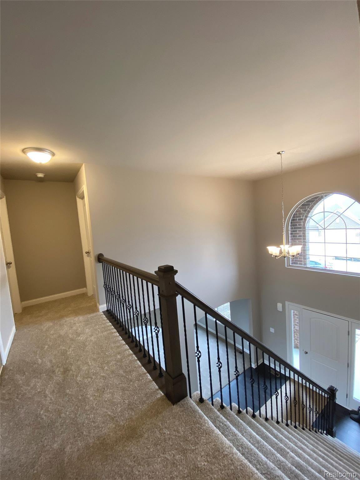 21952 Rustic Drive Macomb, MI 48044 - Photo 12 of 26 2900-Hallway Upstairs.jpg