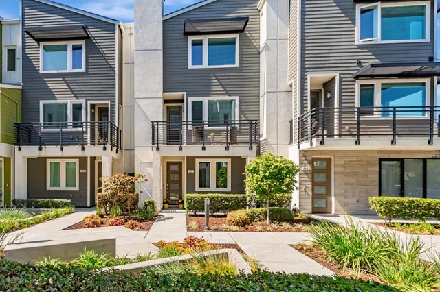 front view of a house with a small yard