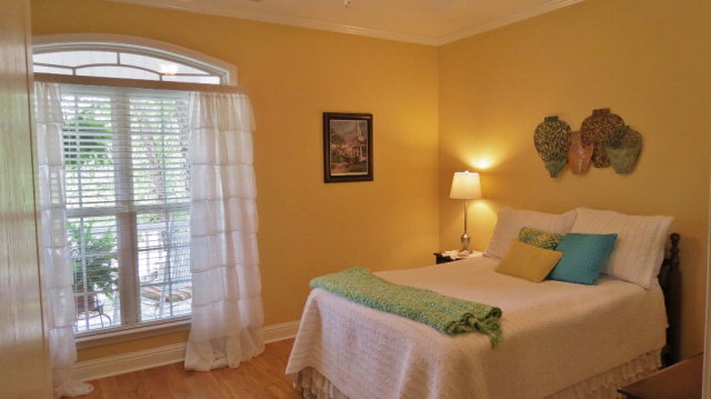 320 Eagle Ridge Road Macon, GA 31216 - Photo 16 of 35 a bedroom with a bed and a window