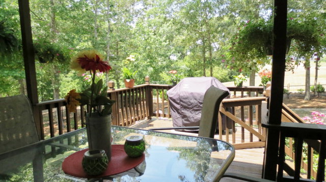 320 Eagle Ridge Road Macon, GA 31216 - Photo 25 of 35 a view of balcony with wooden floor and outdoor seating