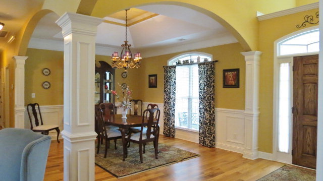 320 Eagle Ridge Road Macon, GA 31216 - Photo 4 of 35 a view of a dining room with furniture and chandelier