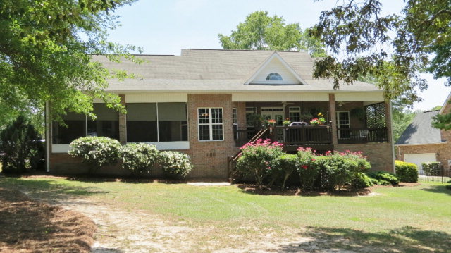 320 Eagle Ridge Road Macon, GA 31216 - Photo 31 of 35 a view of a house with garden and plants