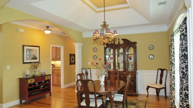 320 Eagle Ridge Road Macon, GA 31216 - Photo 6 of 35 a view of a dining room with furniture and chandelier