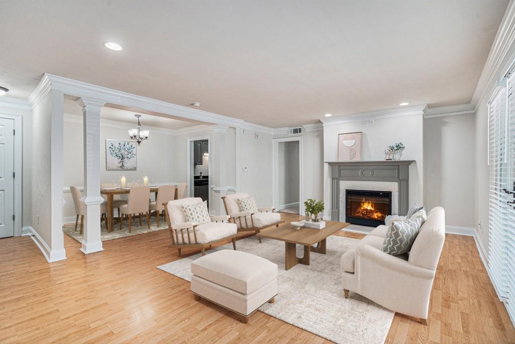 4430 Tilly Mill Road, Unit 818 Atlanta, GA 30360 - Photo 1 of 1 a living room with furniture and a fireplace