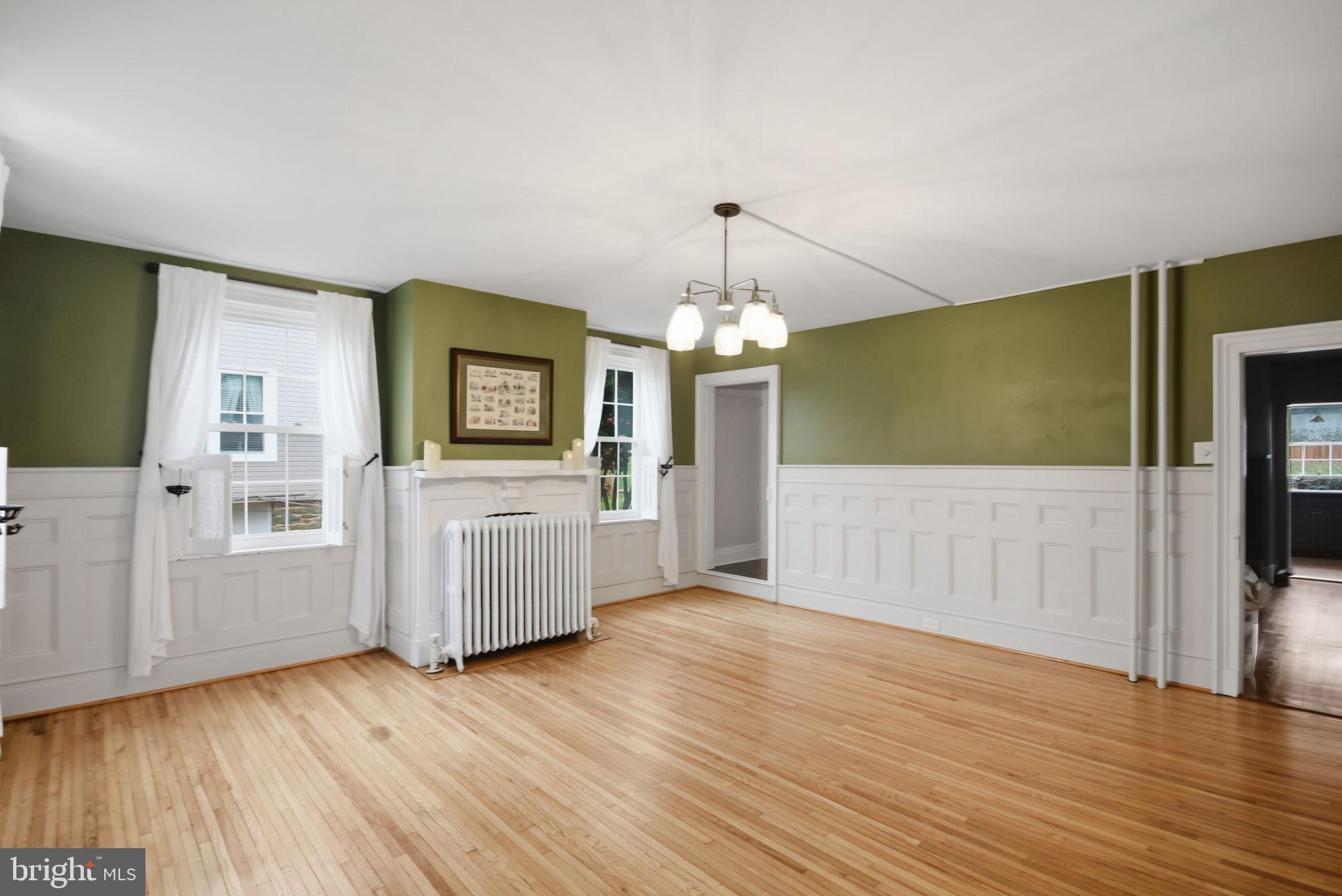 414 High Street New Windsor, MD 21776 - Photo 16 of 51 Family room w/ pass-through to stairway & dining
