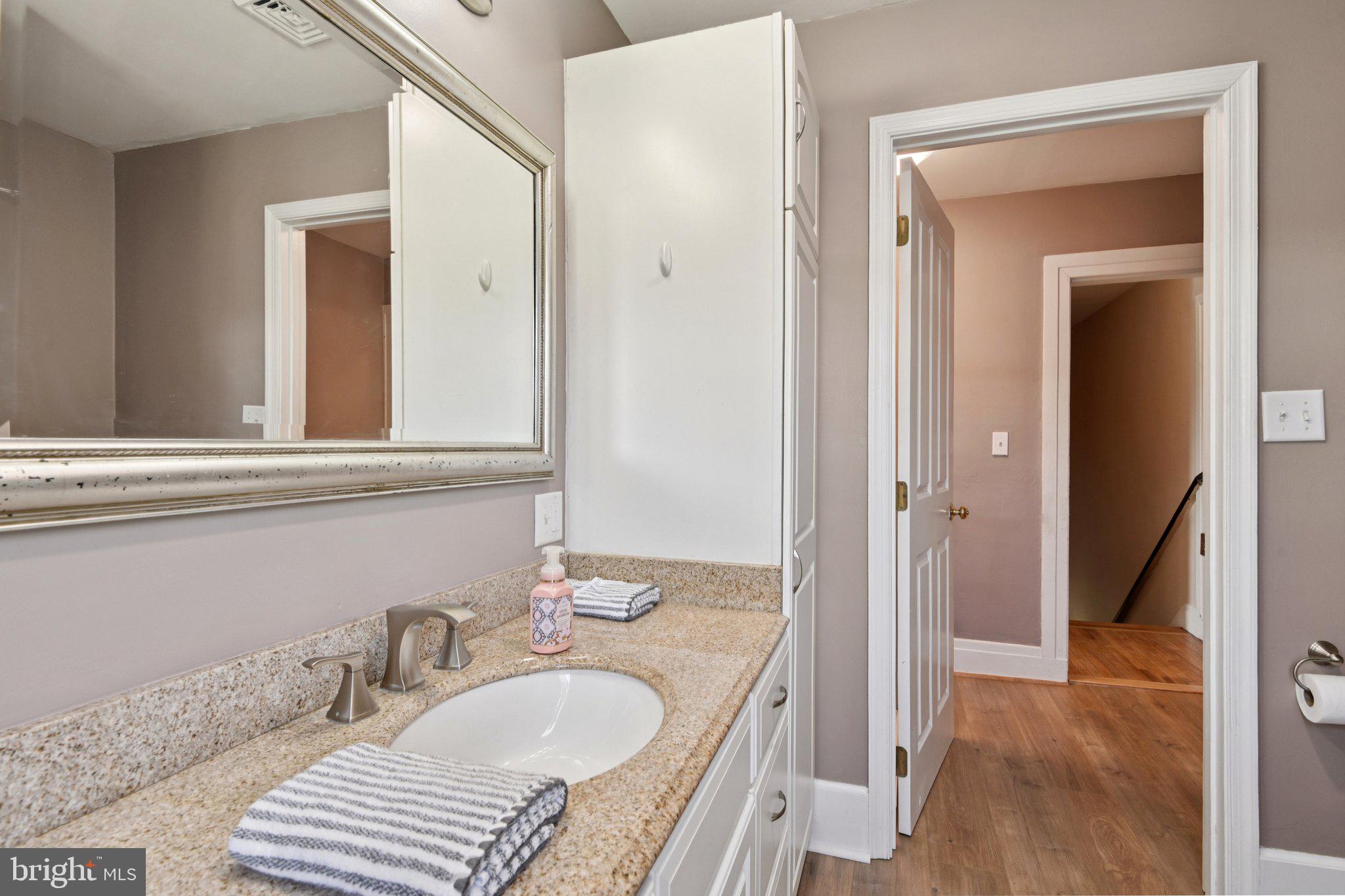 414 High Street New Windsor, MD 21776 - Photo 30 of 51 Main bath linen closet, door to laundry and hall