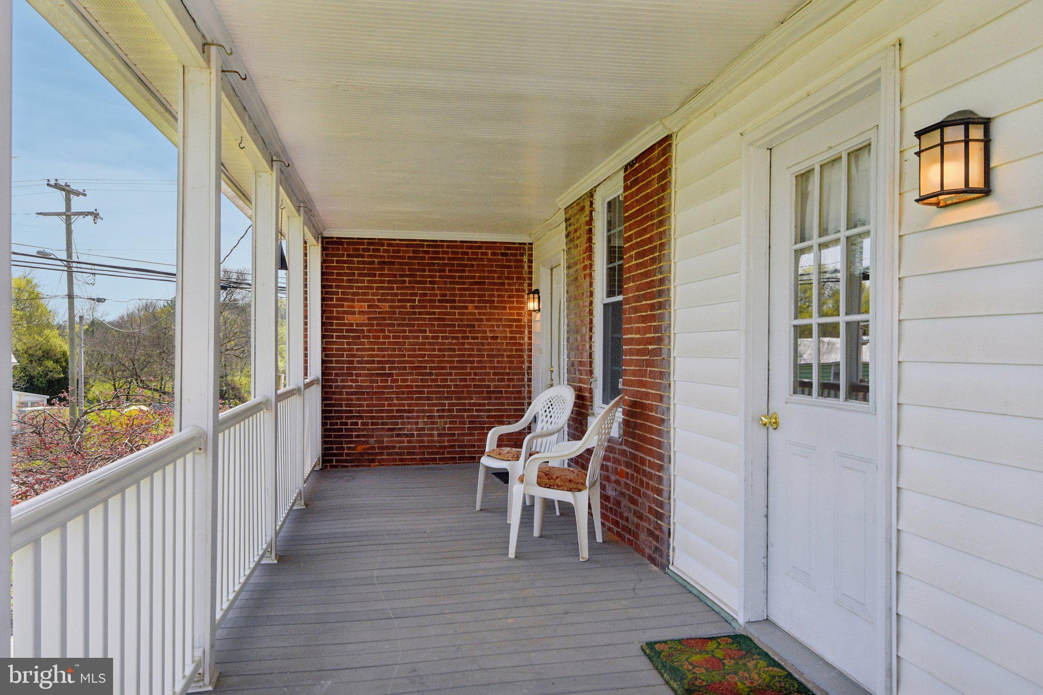 414 High Street New Windsor, MD 21776 - Photo 34 of 51 Side porch, foyer/mudroom and kitchen access
