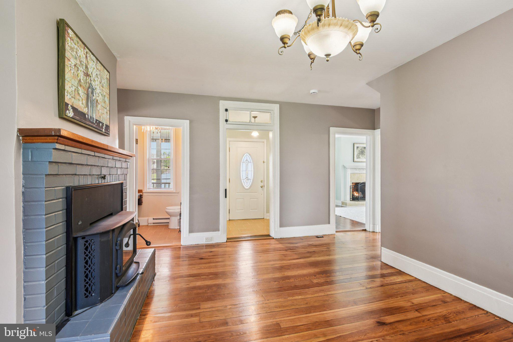 414 High Street New Windsor, MD 21776 - Photo 7 of 51 View of foyer & living rooms from dining