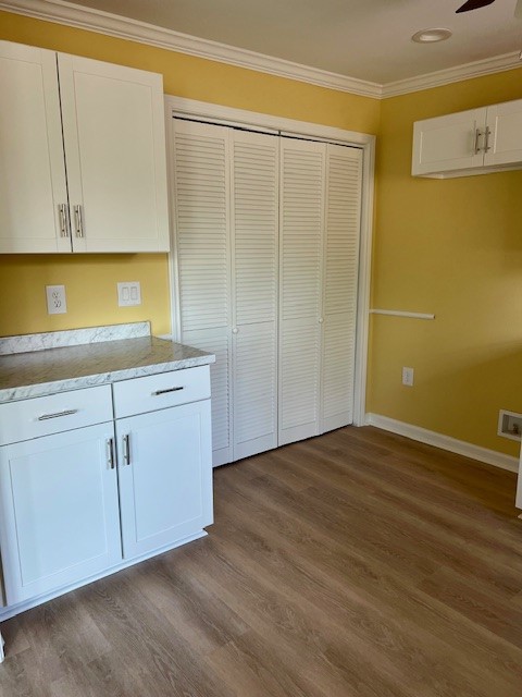425 Caplin Street Houston, TX 77022 - Photo 3 of 9 a view of a kitchen with wooden floor
