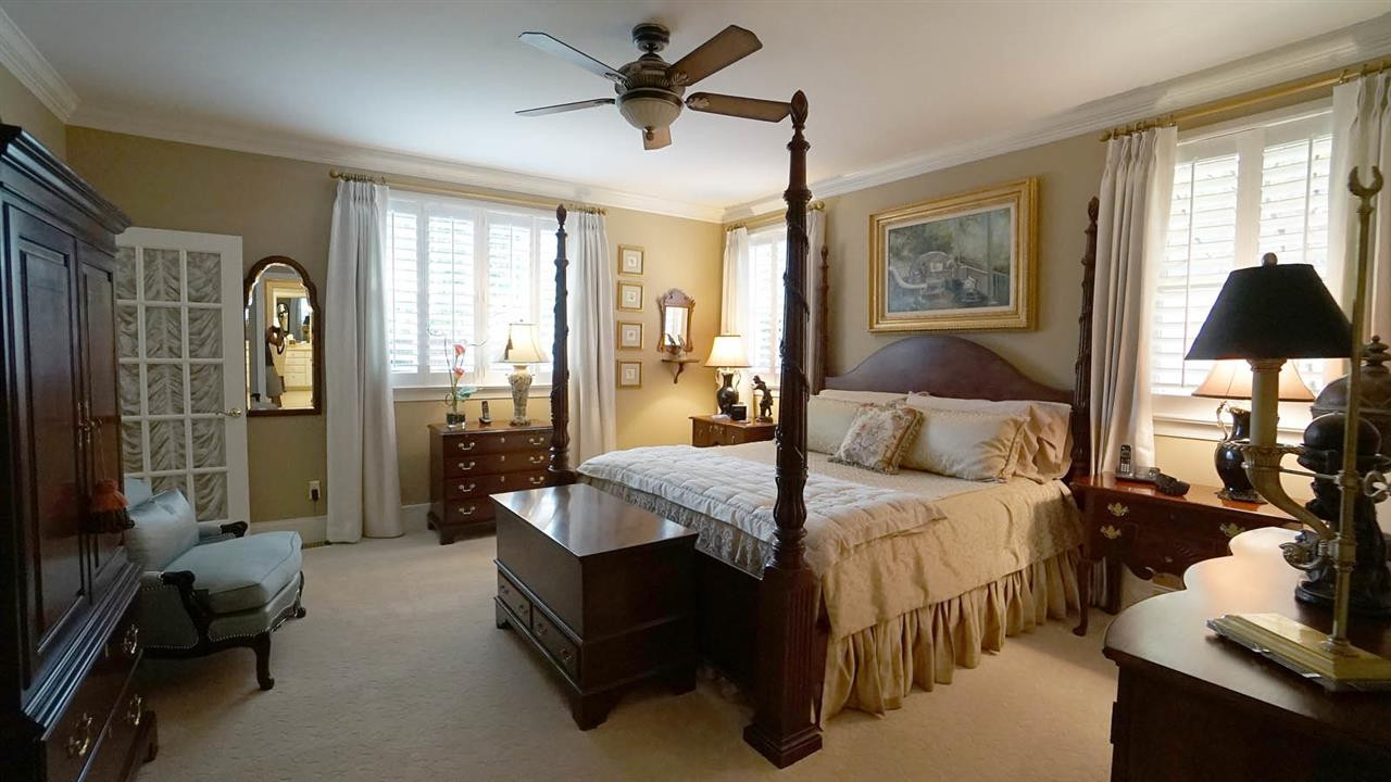 1900 Torrington Street Raleigh, NC 27615 - Photo 12 of 30 Private french door access to sunroom. Custom closet design Master Bedroom