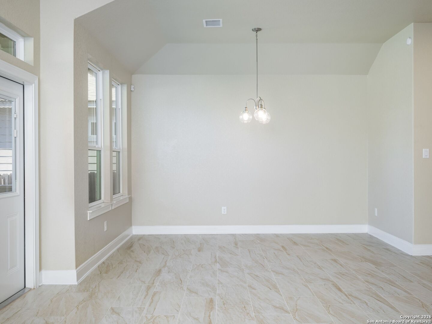 14681 Main Street Lytle, TX 78052 - Photo 15 of 33 a view of a room with window and hardwood floor
