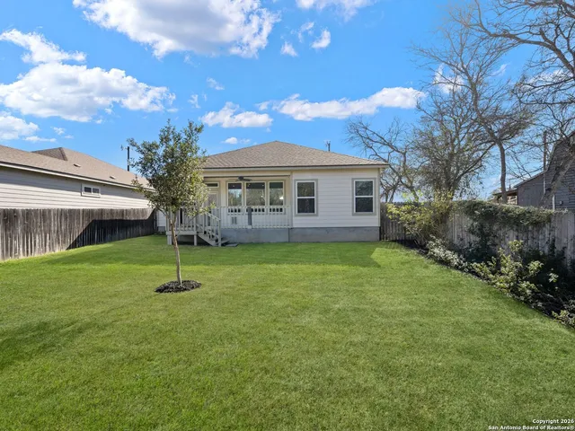 a house view with a garden space