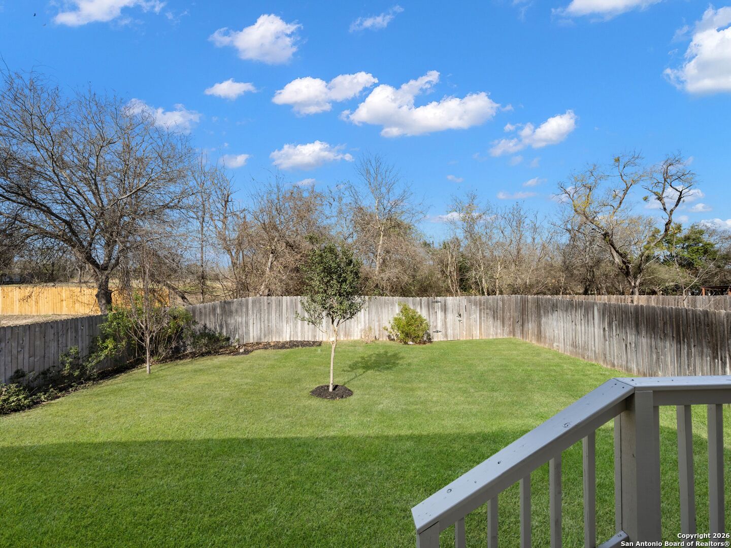 14681 Main Street Lytle, TX 78052 - Photo 30 of 33 a view of a lake with a yard