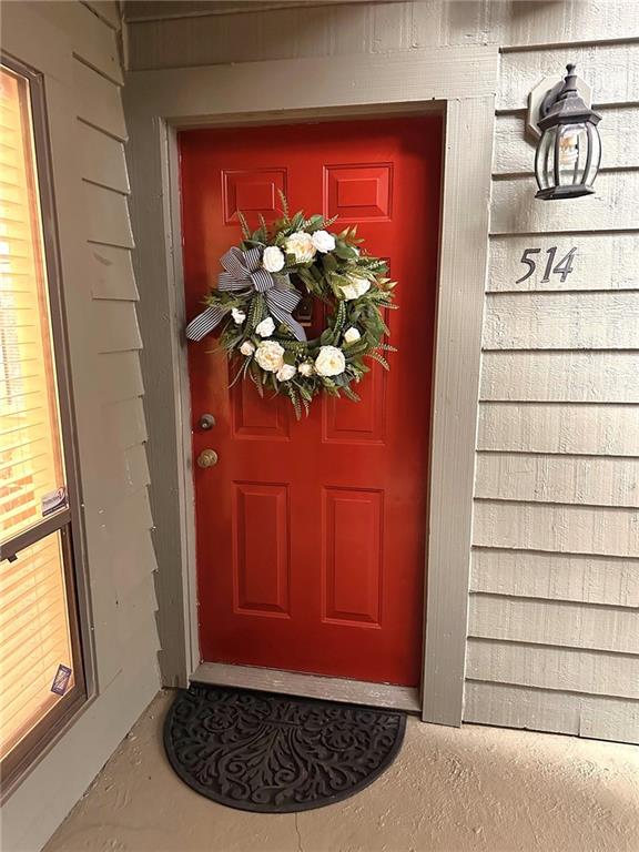 514 Tuxworth Circle Decatur, GA 30033 - Photo 2 of 34 a view of a door with a potted plant