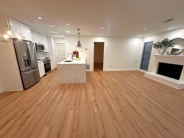 514 Tuxworth Circle Decatur, GA 30033 - Photo 3 of 34 a view of a kitchen with refrigerator microwave and cabinets