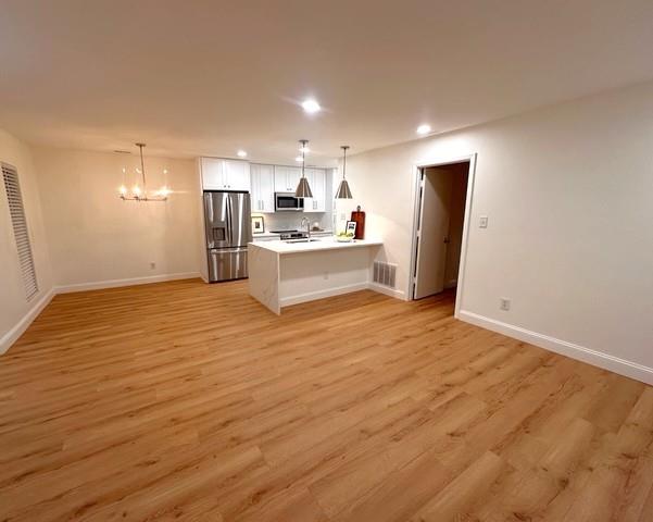 514 Tuxworth Circle Decatur, GA 30033 - Photo 4 of 34 a large kitchen with a sink stainless steel appliances and cabinets