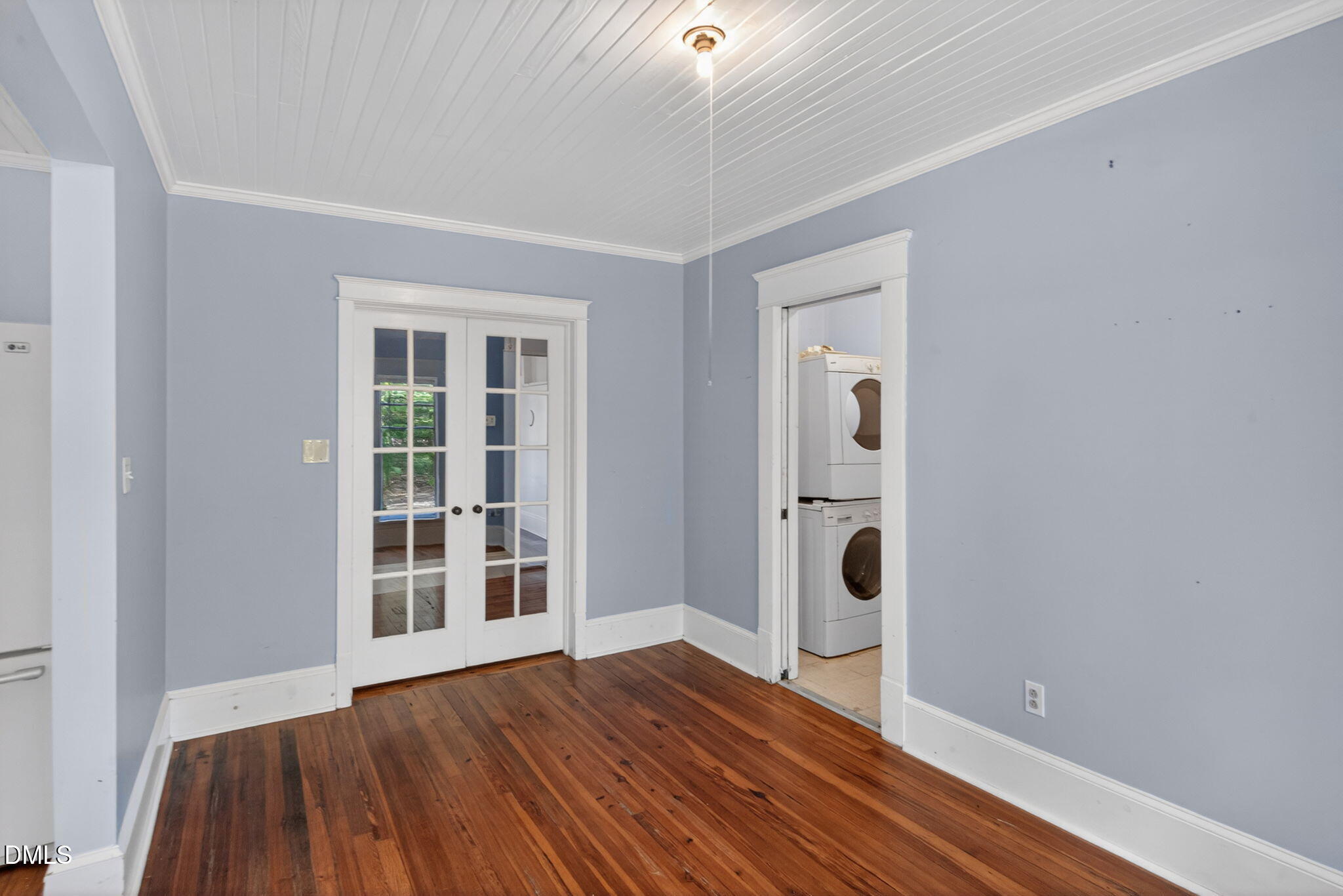 1714 Terry Road Durham, NC 27712 - Photo 11 of 39 a view of an empty room with wooden floor and windows