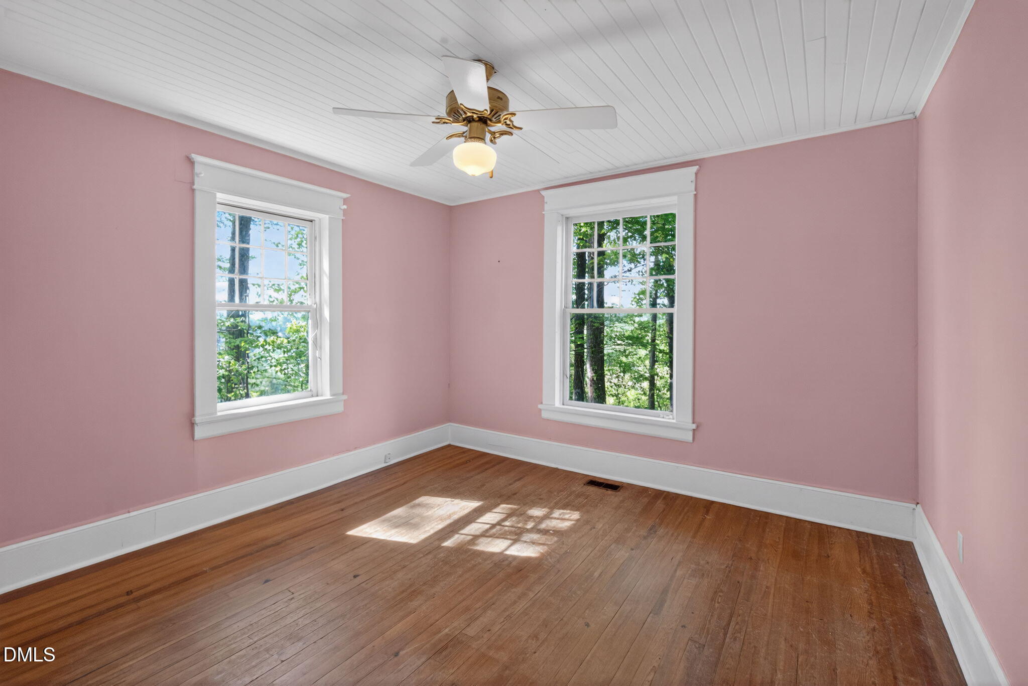 1714 Terry Road Durham, NC 27712 - Photo 16 of 39 a view of empty room with wooden floor and fan