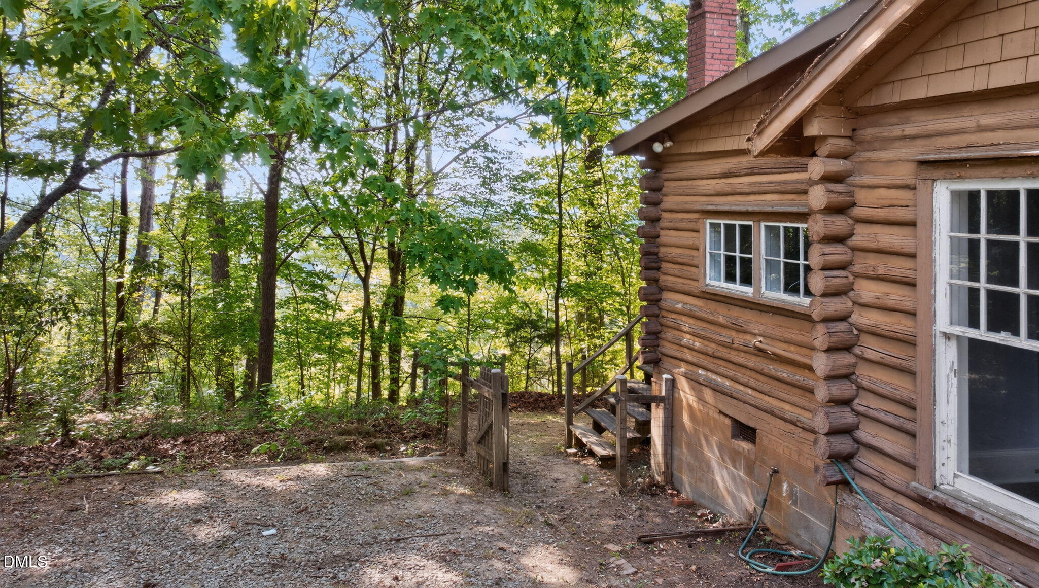 1714 Terry Road Durham, NC 27712 - Photo 21 of 39 a view of a house with a backyard