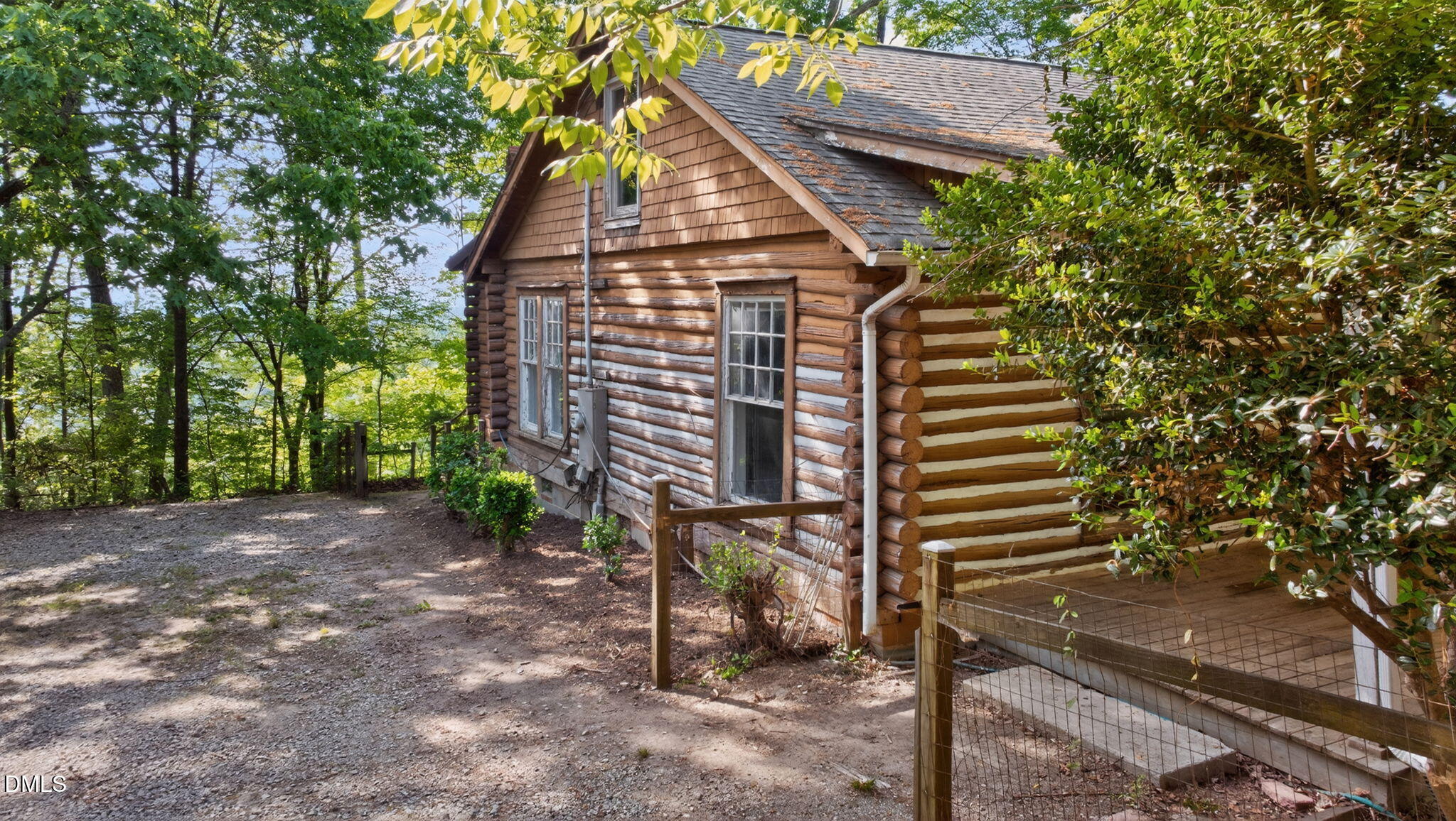 1714 Terry Road Durham, NC 27712 - Photo 22 of 39 a backyard of a house with table and chairs