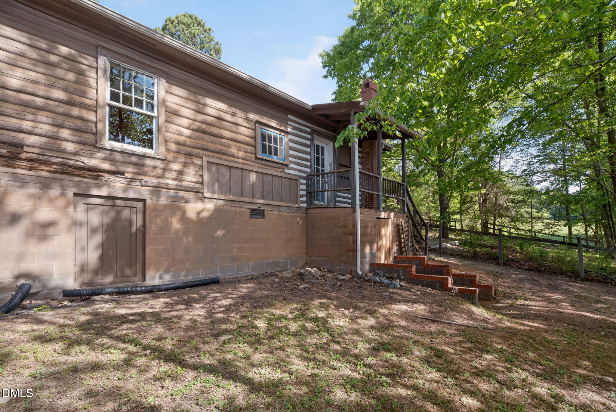 1714 Terry Road Durham, NC 27712 - Photo 23 of 39 a backyard of a house with lots of green space