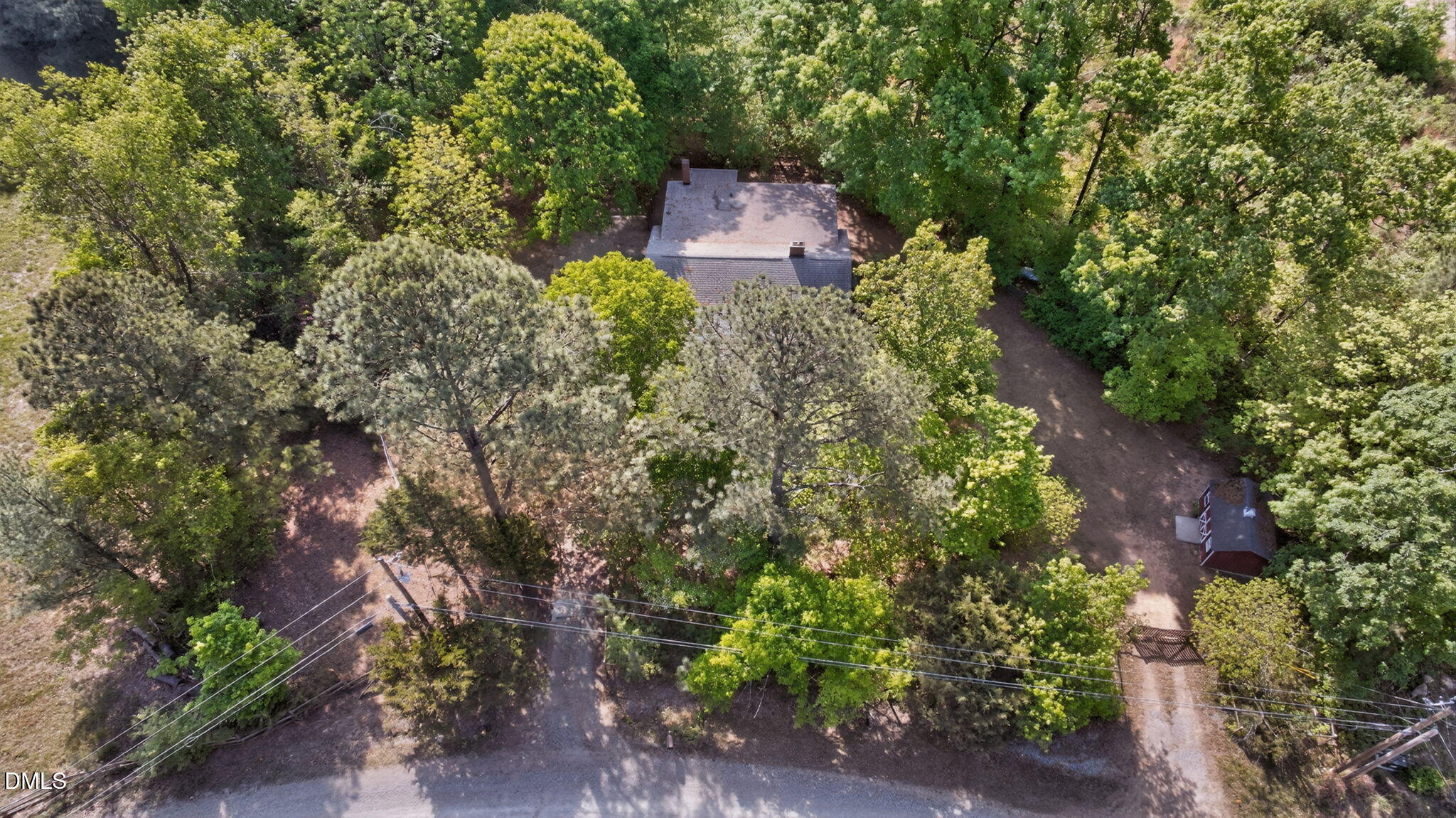 1714 Terry Road Durham, NC 27712 - Photo 29 of 39 an aerial view of a house with a yard and large tree