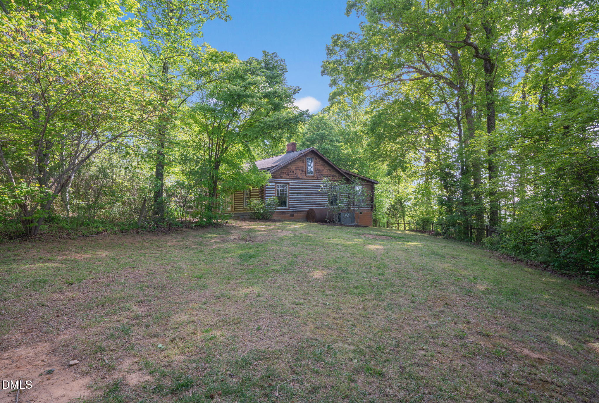 1714 Terry Road Durham, NC 27712 - Photo 3 of 39 a view of a house with yard and a tree